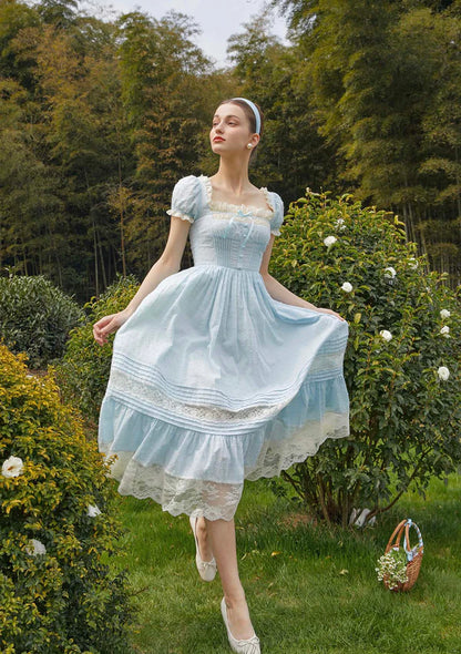 Light Blue Swiss Dot Midi Dresses with Square Neck Lace Trim Puff Sleeves Velvet Bow Smocked Waist and Tiered Lace Skirt