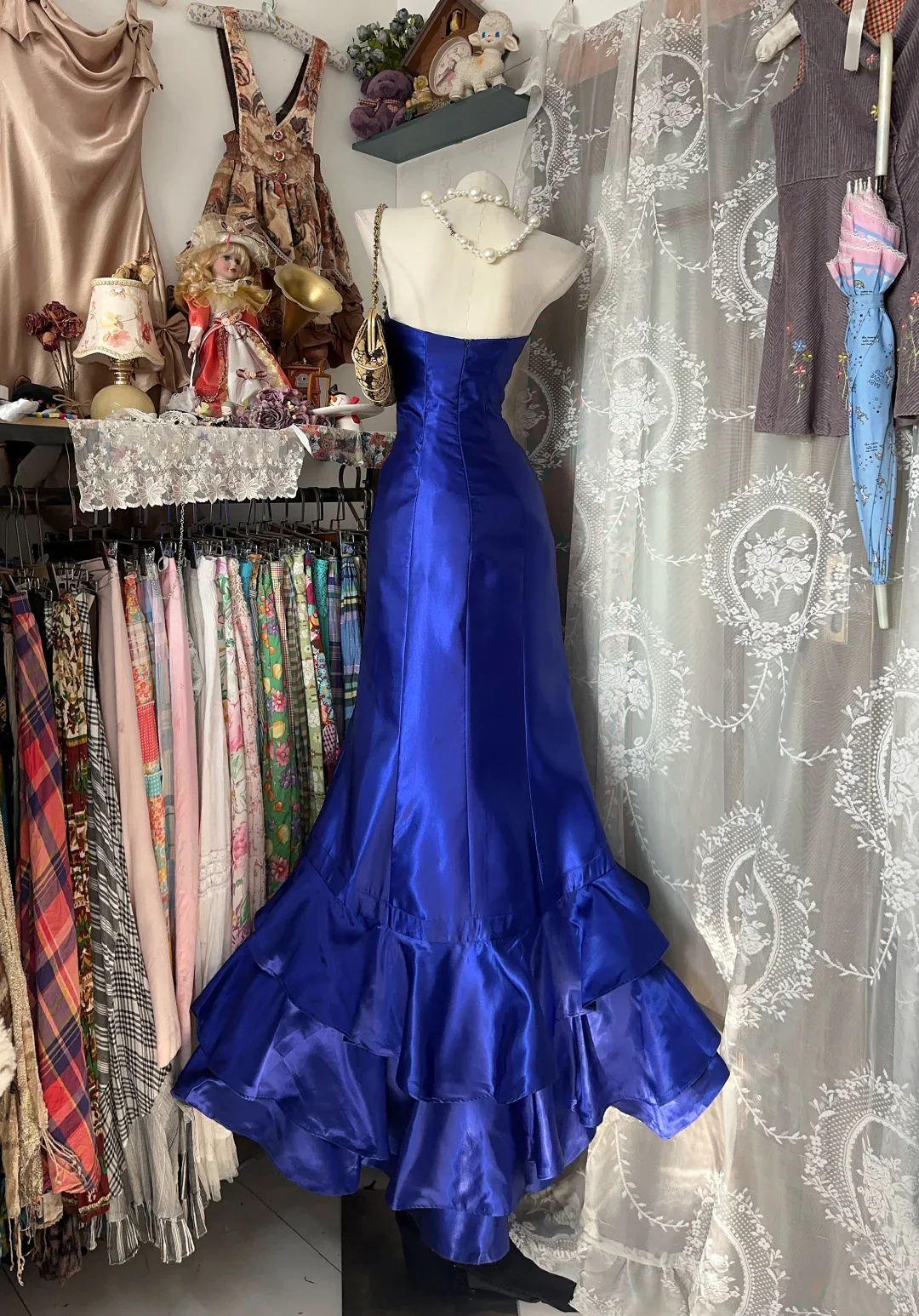 Strapless Satin Mermaid Evening Dress with Ruffled Hem and Rhinestone Buckle Detail