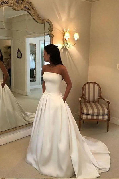 A-line Strapless Open Back Satin Ivory Wedding Dress with Pockets