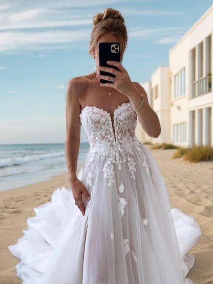 A-Line/Princess Tulle Applique Off-the-Shoulder Long Sleeves Court Train Corset Wedding Dresses